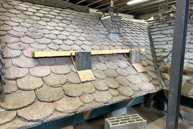 présentation d'une toiture faite par des couvreurs